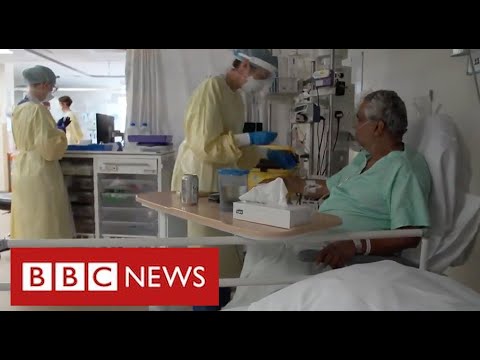 Hospitals under pressure again as Covid admissions rise sharply – BBC News