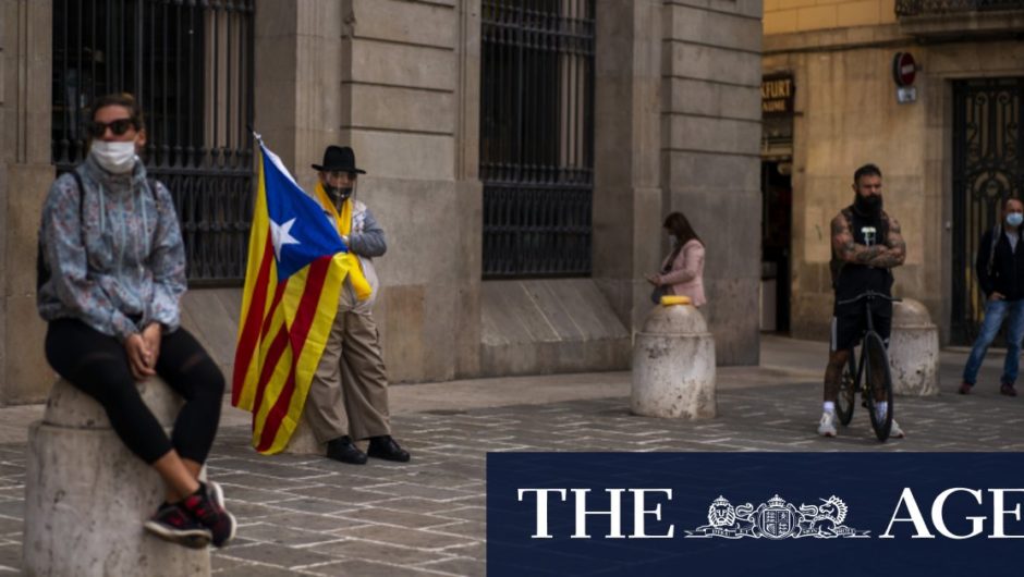 Spanish police arrest 21 in raids on Catalan separatists