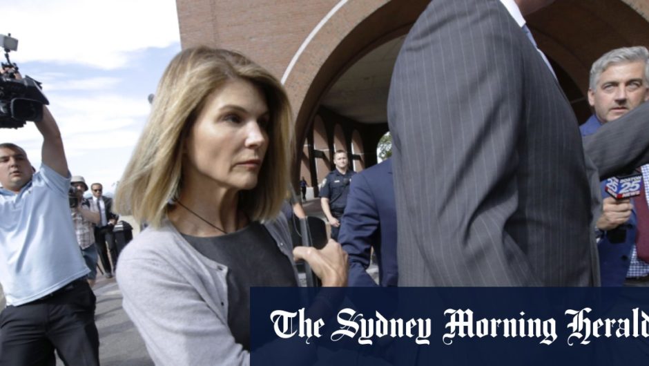 Actor Lori Loughlin reports to prison in college admissions scam