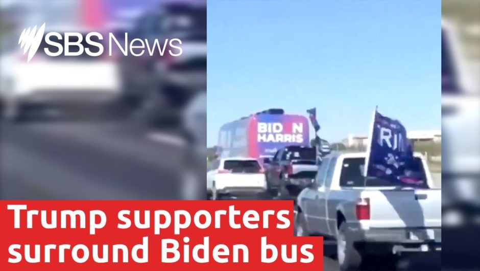 US President Donald Trump supporters surround Joe Biden's campaign bus on Texas highway I SBS News