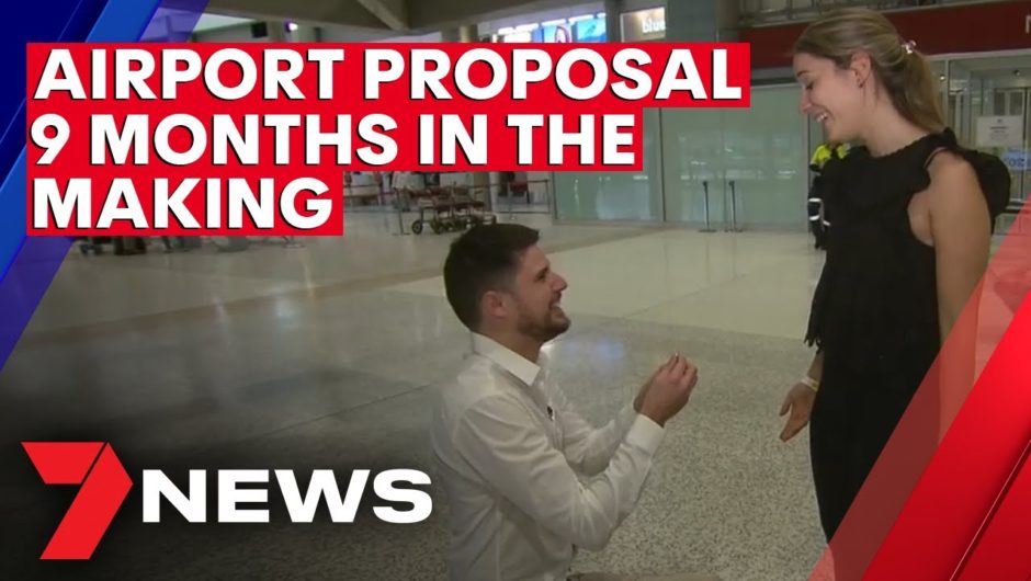 COVID-19: Man proposes to partner at airport after nine months apart | 7NEWS