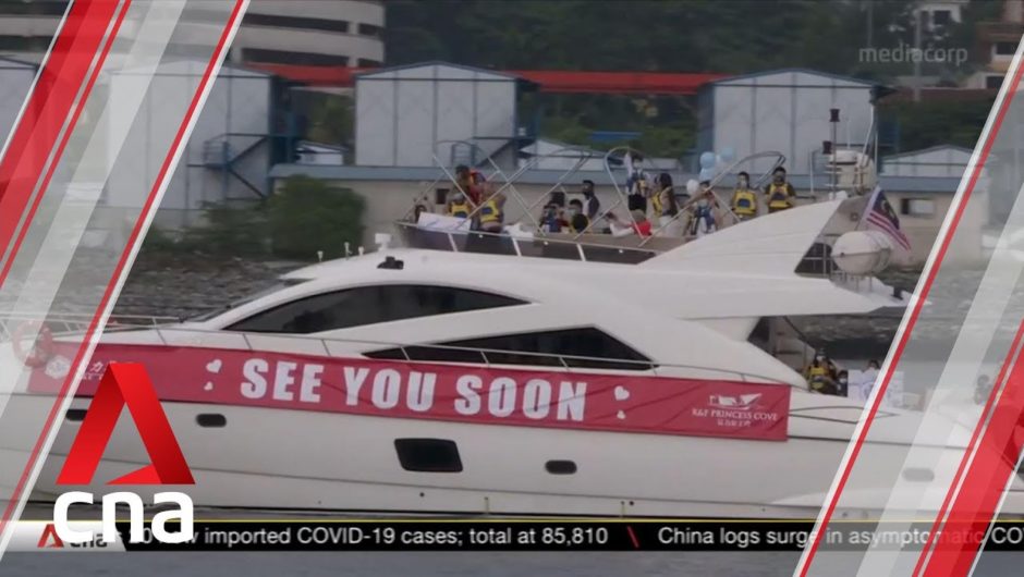 COVID-19: Malaysian families board yacht to see loved ones in Singapore