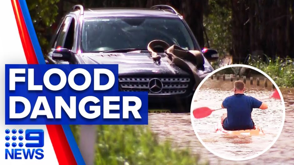 Elderly couple rescued from floodwaters in NSW | 9 News Australia