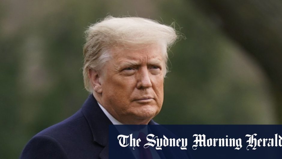 Wall St hits record high after Trump signs US fiscal aid bill