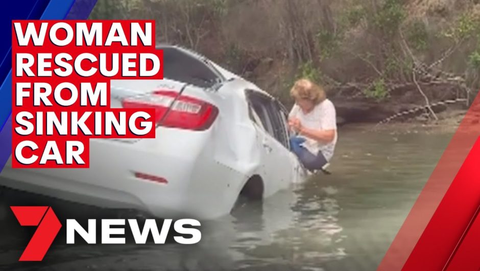 Woman rescued from sinking car after crashing into NSW river | 7NEWS