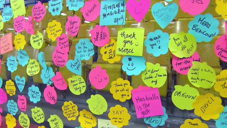 This vaccination clinic has a mural of post-it notes to thank workers