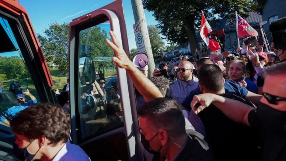 Trudeau hit by gravel at heated protest during Ontario campaign stop