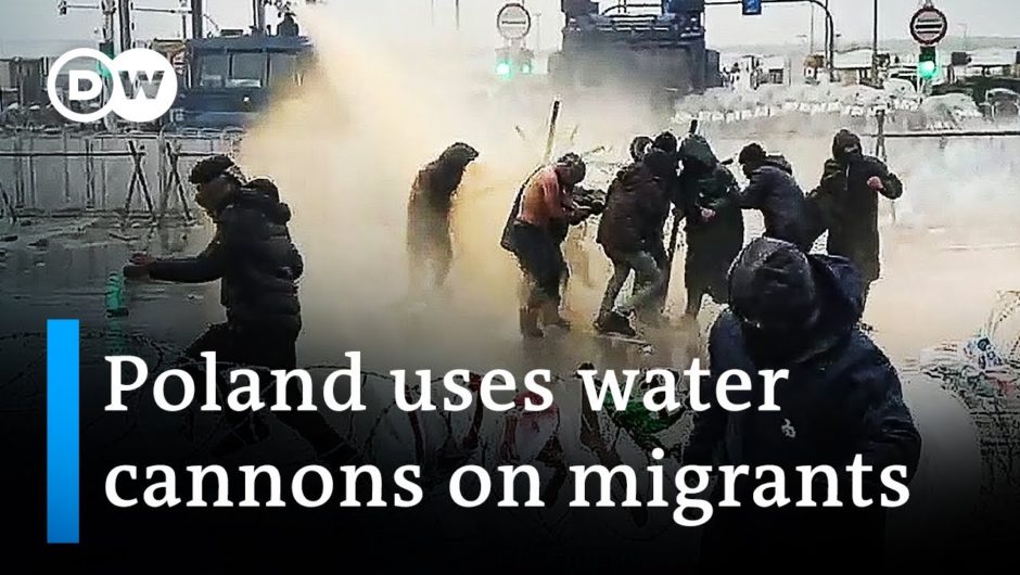 Polish security forces use water cannons in clash with migrants | DW News